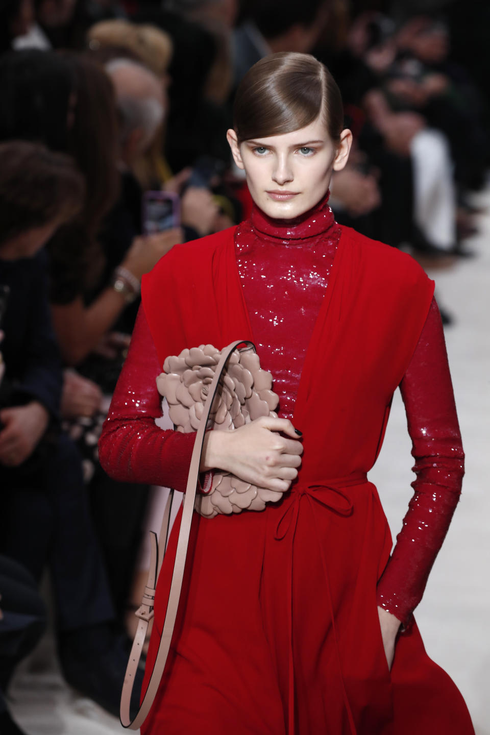 A model wears a creation for the Valentino fashion collection during Women's fashion week Fall/Winter 2020/21 presented in Paris, Sunday, March 1, 2020. (AP Photo/Francois Mori)