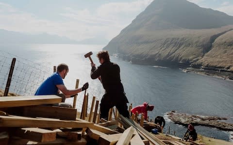 100 volunteers from 25 countries were put to work - Credit: Visit Faroe Islands