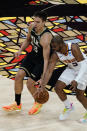 Phoenix Suns guard Chris Paul (3) knocks the ball away from Atlanta Hawks guard Bogdan Bogdanovic (13) in the second half of an NBA basketball game Wednesday, May 5, 2021, in Atlanta. (AP Photo/John Bazemore)