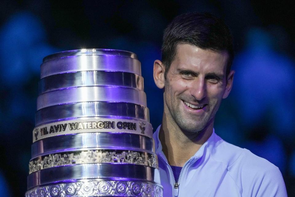 Novak Djokovic poses with the trophy after winning the Tel Aviv Watergen Open (Ariel Schmidt/AP/PA) (AP)