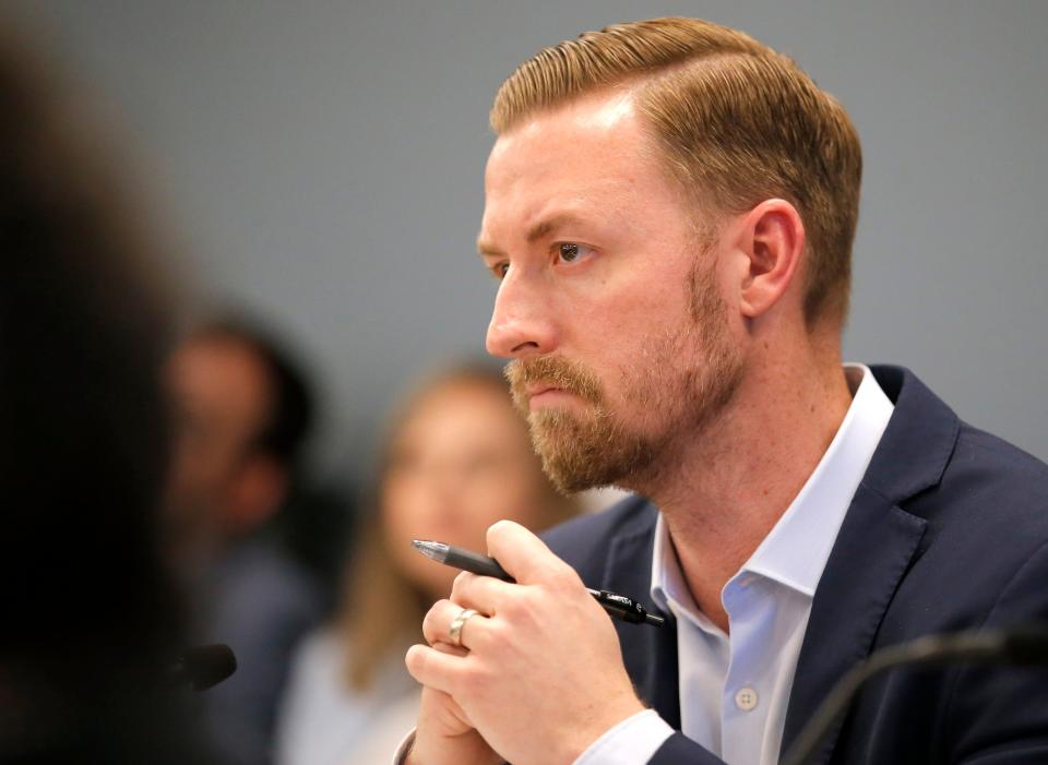 Ryan Walters, state schools superintendent, listens to comments Thursday during a meeting with the Oklahoma State Board of Education in Oklahoma City.