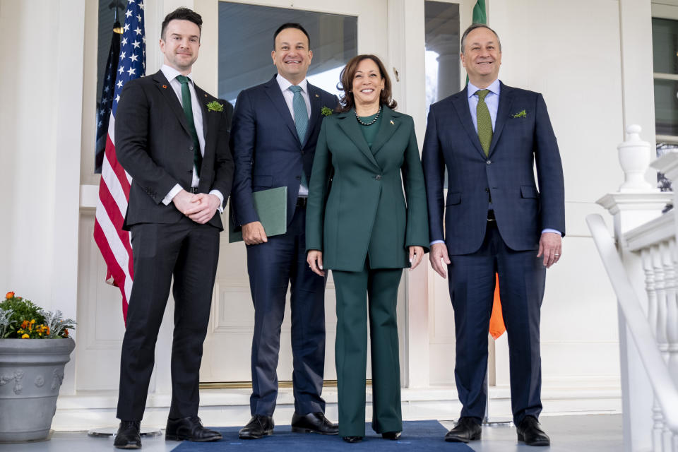 Vice President Kamala Harris, second gentleman Doug Emhoff, right, Ireland's Taoiseach Leo Varadkar, second from left, and his partner Matthew Barrett, left, pose for photographs as they arrive for a St. Patrick's Day Breakfast at the Vice President's residence in Washington, Friday, March 17, 2023. (AP Photo/Andrew Harnik)