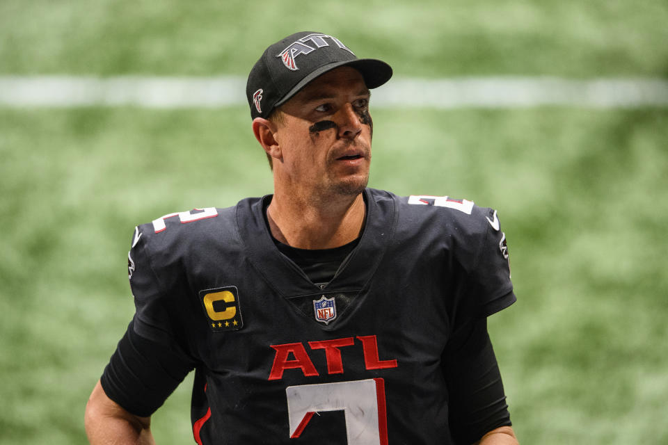 FILE - In this Sunday, Sept. 27, 2020, file photo, Atlanta Falcons quarterback Matt Ryan (2) walks off the field after an NFL football game against the Chicago Bears in Atlanta. Ryan isn't allowing himself to wonder if the ouster of the Atlanta Falcons' coach and general manager this week could lead to a roster overhaul following the season that could impact his career. (AP Photo/Danny Karnik, File)