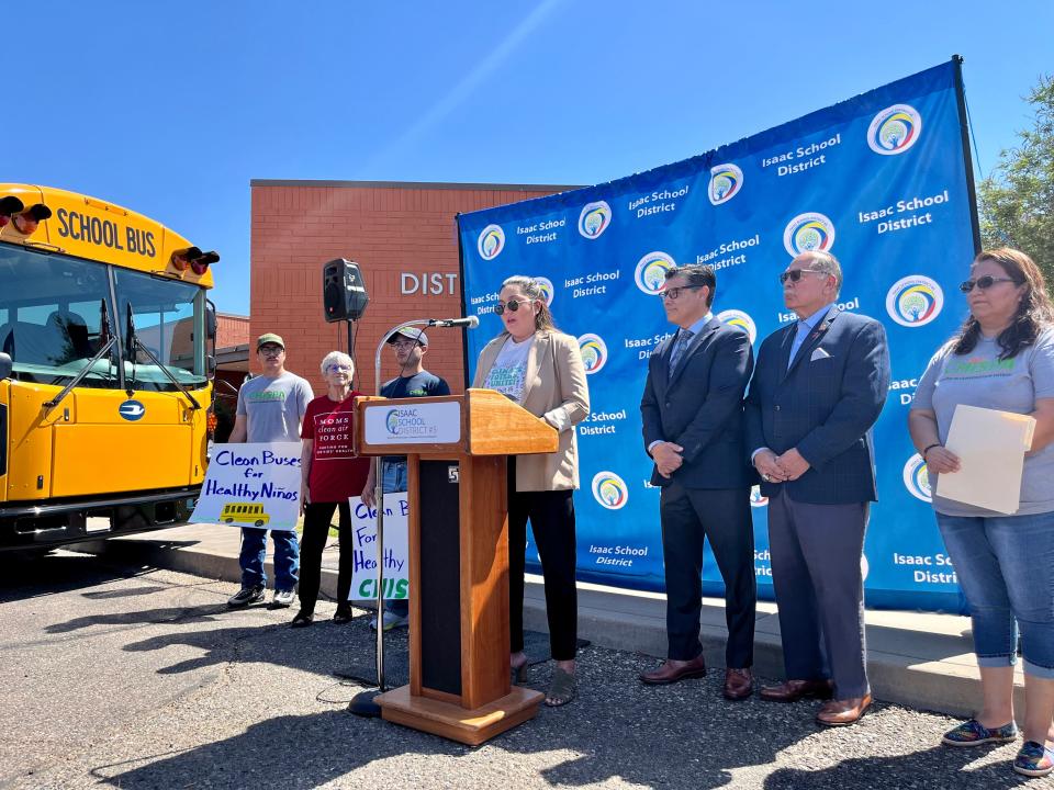 Anabel Maldonado, director of political programs in Arizona for the Environmental Defense Fund, speaks about her own experiences growing up with asthma worsened by air pollution, during a  May 9, 2023, event about electric school bus funding awarded to Isaac School District in Phoenix.