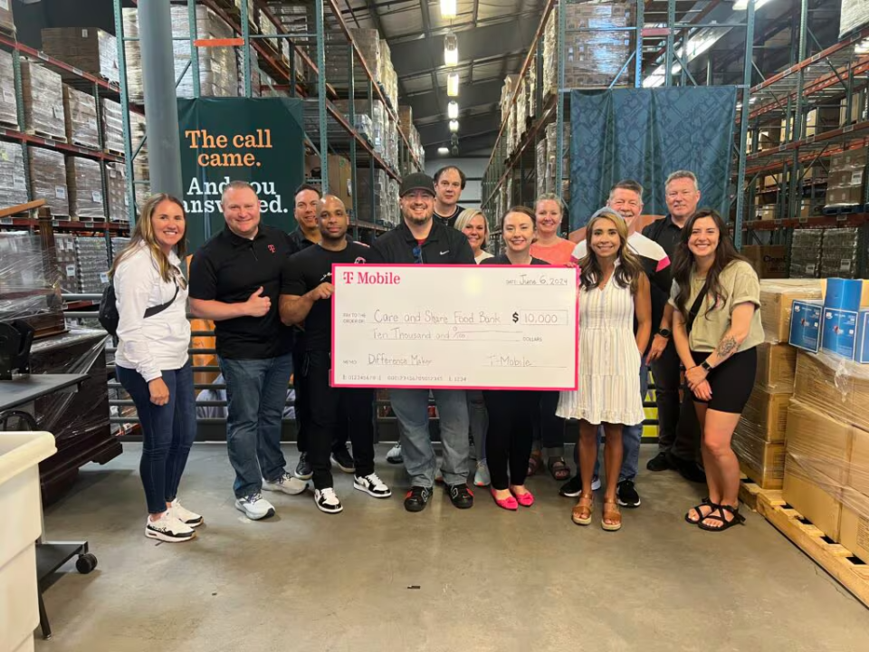 Care and Share Food Bank for Southern Colorado receives $10,000 donation from T-Mobile employees.