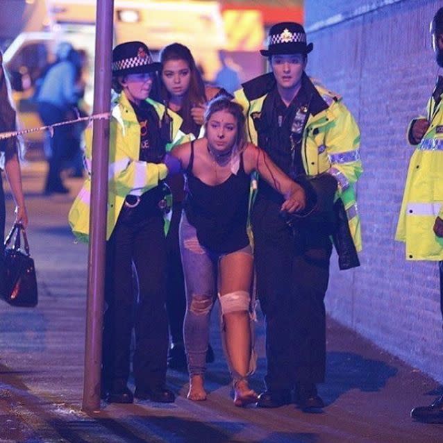 Manchester Police help a young injured woman. Source: Instagram