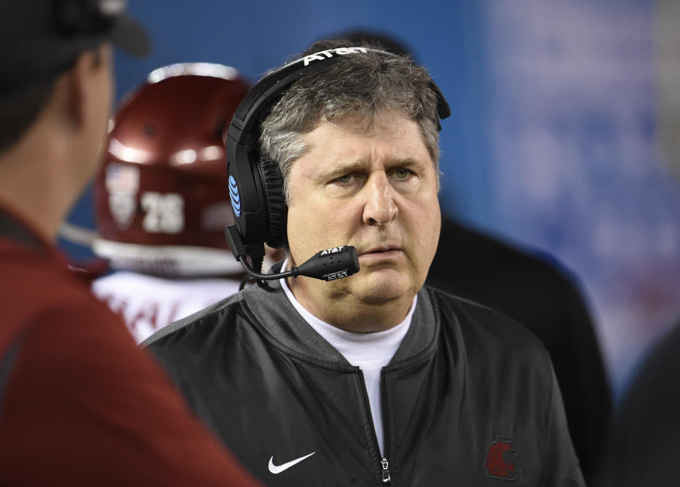 Washington State head coach Mike Leach looks on from the sidelines during the first half of the Holiday Bowl NCAA college football game against Michigan State Thursday, Dec. 28, 2017, in San Diego. (AP Photo/Denis Poroy)