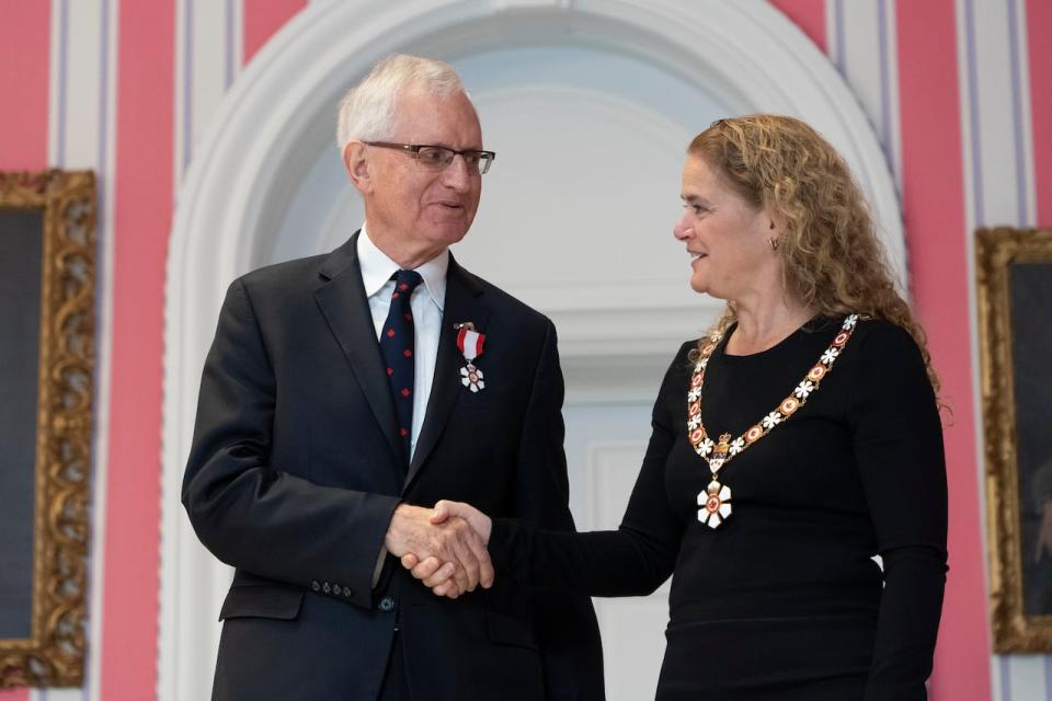 John Godfrey, of Toronto, Ont., is invested as a Member of the Order of Canada by Governor General Julie Payette during a ceremony at Rideau Hall in Ottawa on Thursday, November 21, 2019.