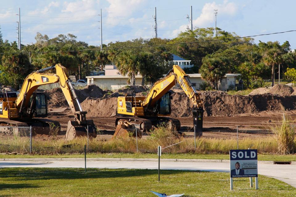 Construction crews clear land for the future site of King's Landing between Indian River Drive and Second Street on Monday, Nov. 14, 2022.