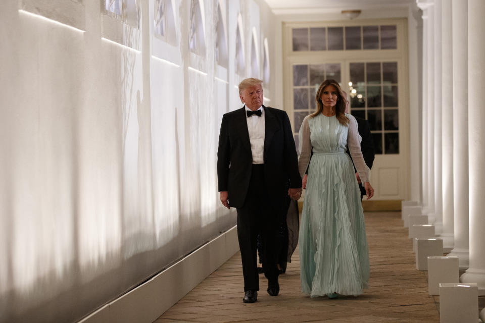 President Donald Trump and first lady Melania Trump arrive for a State Dinner with Australian Prime Minister Scott Morrison and his wife, Jenny Morrison, Friday, Sept. 20, 2019, in Washington. (AP Photo/Evan Vucci)