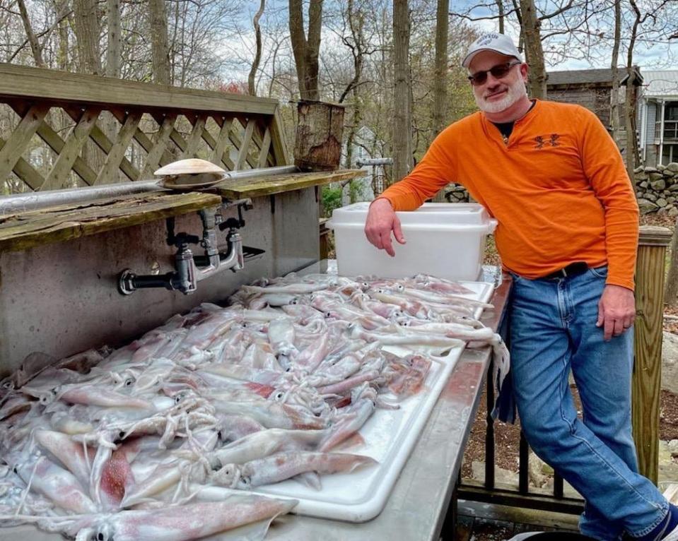 Greg Vespe of Tiverton, aka "The Squid Whisperer," heled catch five gallons) of squid.