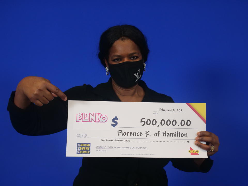 Florence Kalu from Hamilton, Ont., won the first $500,000 Plinko prize. The Plinko board is the same as the one that appears in 'The Price is Right'. (OLG)