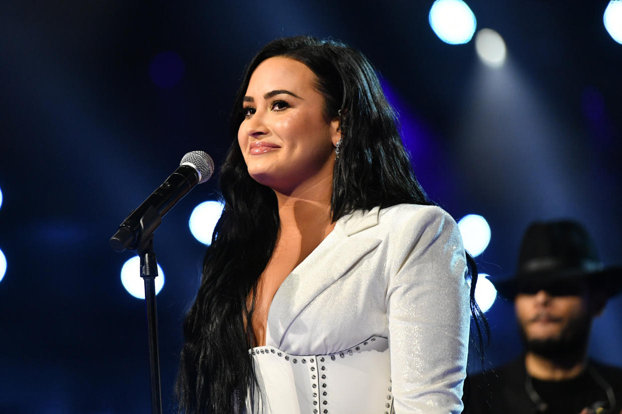 Demi Lovato recently opened up about overexercising and wishing someone recognized the signs of her eating disorder on the podcast "Pretty Big Deal With Ashley Graham." (Photo: Emma McIntyre via Getty Images)