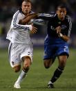 CARSON, CA - APRIL 03: David Beckham #23 of the Los Angeles Galaxy paces Jason Hernandez #21 of the San Jose Earthquakes to the ball in the second half during their MLS game at the Home Depot Center on April 3, 2008 in Carson, California. The Galaxy defeated the Earthquakes 2-0. (Photo by Victor Decolongon/Getty Images)