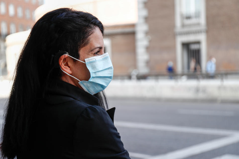 MADRID, SPAIN - JUNE 11: Veronica, a cochlear implant user and member of FIAPAS (Spanish Confederation of Families of the Deaf), speaks next to the Arc de la Victoria in Moncloa with Patricia, a FIAPAS worker, during phase 2 of the coronavirus deescalation plan on June 11, 2020 in Madrid, Spain. People with hearing problems are encountering difficulties in daily life  due to the lack of written indications and face masks obscuring mouths. (Photo by Óscar J. Barroso/Europa Press via Getty Images)