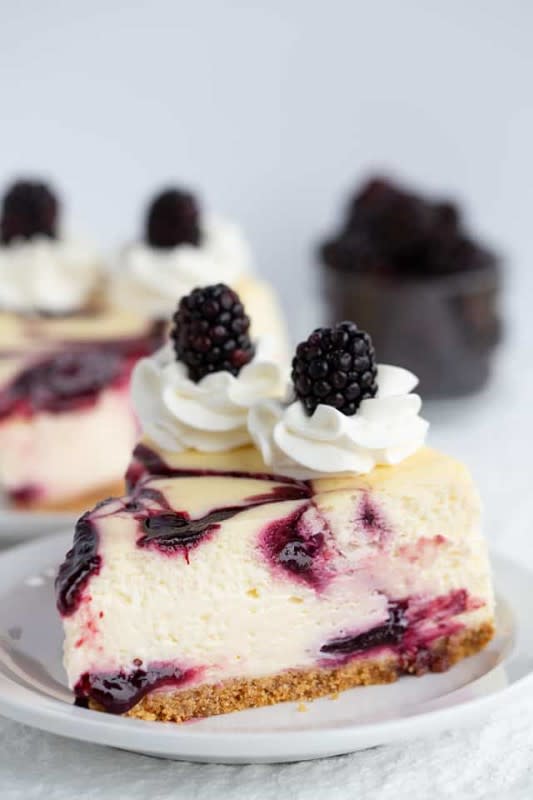 <p>Cookie Dough and Oven Mitt</p><p>Blackberry cheesecake is creamy vanilla cheesecake with a hint of lemon in it. It has swirls of fresh blackberry sauce and is baked on a golden Oreo cookie crust.</p><p><strong>Get the recipe: <a href="https://www.cookiedoughandovenmitt.com/blackberry-cheesecake/" rel="nofollow noopener" target="_blank" data-ylk="slk:Blackberry Cheesecake;elm:context_link;itc:0;sec:content-canvas" class="link ">Blackberry Cheesecake</a></strong></p>