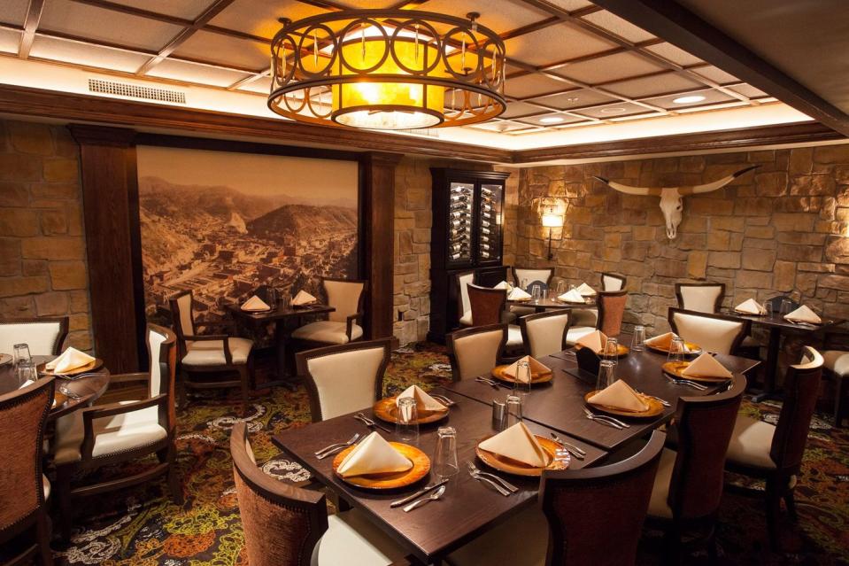 <p>The peak of the Gold Rush brought a flood of visitors to Deadwood, and <a href="https://www.tripadvisor.com/Restaurant_Review-g54578-d7262927-Reviews-Deadwood_Legends_Steakhouse_at_The_Franklin_Hotel-Deadwood_South_Dakota.html" rel="nofollow noopener" target="_blank" data-ylk="slk:this eatery;elm:context_link;itc:0;sec:content-canvas" class="link ">this eatery</a>, originally part of the Silverado Franklin Hotel, became a local hotspot. It was built in 1902 on the site of one of the first gold discoveries, and greats such as John Wayne, Buffalo Bill, and Teddy Roosevelt stopped in through the years for prime rib.</p>