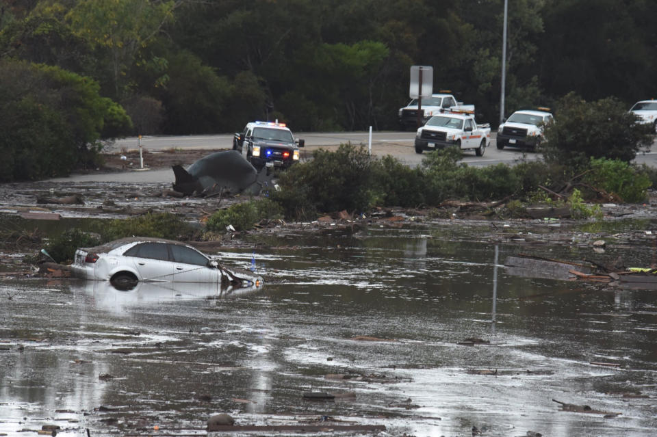 An abandoned car floats along the freeway in Montecito.