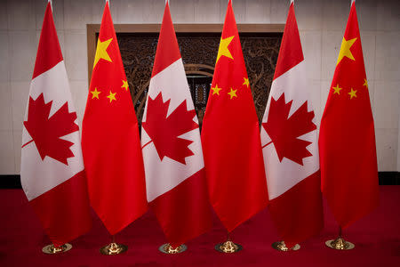 Picture of Canadian and Chinese flags taken prior to the meeting with Canada's Prime Minister Justin Trudeau and China's President Xi Jinping at the Diaoyutai State Guesthouse on December 5, 2017, in Beijing. Fred Dufour/Pool via REUTERS/Files