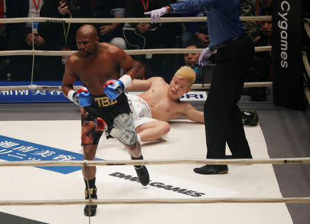 Boxing - Floyd Mayweather v Tenshin Nasukawa - Saitama Super Arena, Tokyo, Japan - December 31, 2018 Floyd Mayweather knocks down Tenshin Nasukawa in the first round REUTERS/Issei Kato