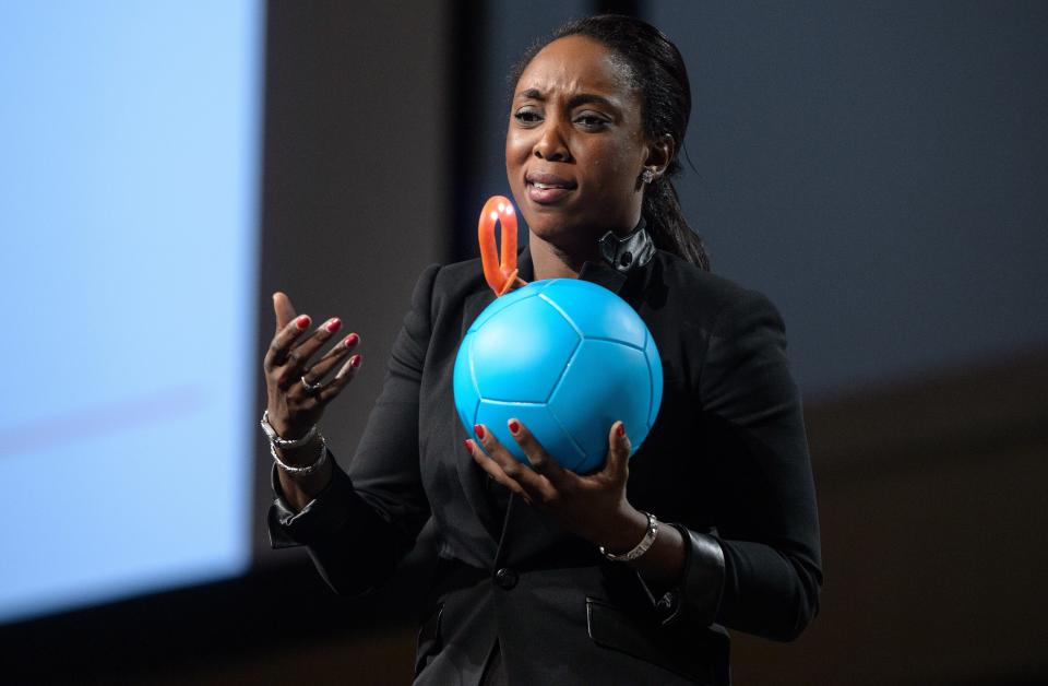 Uncharted Play founder and CEO Jessica Matthews shows her company’s invention, Soccket, a soccer ball that generates electricity for an attachable reading lamp, at the Forbes Under 30 Summit in Philadelphia, 2014. (Photo: NICHOLAS KAMM/AFP/Getty Images)
