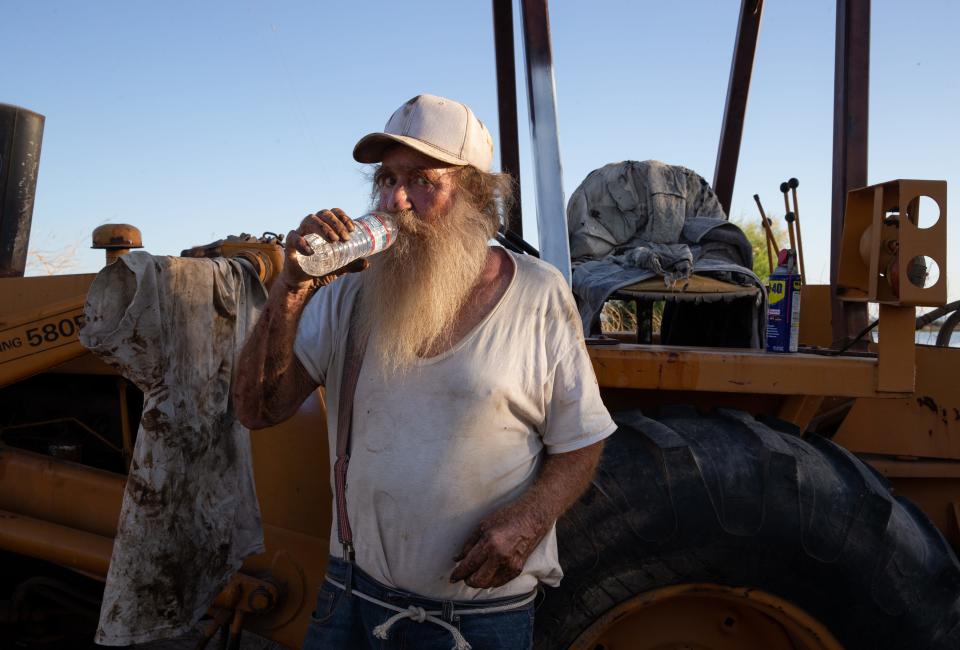 A portrait of Claude Cranmer, Jr., April 16, 2021, at his farm near Cibola, Arizona. Cranmer has been farming since 1974.