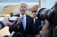 President Joe Biden speaks to reporters before boarding Air Force One at Geneva Airport in Geneva, Switzerland, Wednesday, June 16, 2021. Biden is returning to Washington as he wraps up his trip to Europe. (AP Photo/Patrick Semansky)