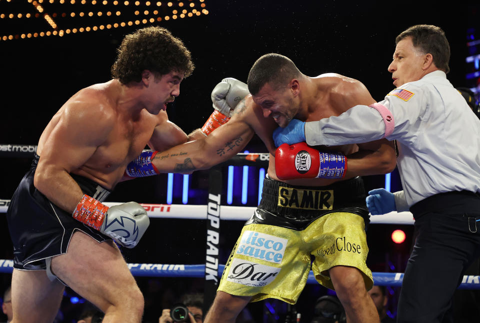 NEW YORK, NEW YORK - OCTOBER 29:  Richard Torrez Jr. punches Ahmed Hefny during their heavyweight bout at The Hulu Theater at Madison Square Garden on October 29, 2022 in New York City.  (Photo by Al Bello/Getty Images)