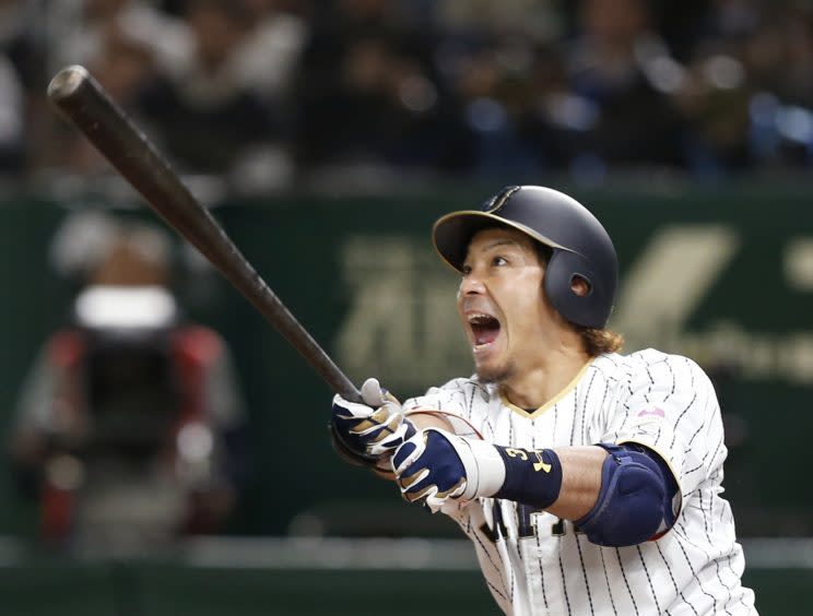 Japan's Nobuhiro Matsuda hits an RBI double against Israel during the sixth inning of their second round game at the World Baseball Classic at Tokyo Dome in Tokyo, Wednesday, March 15, 2017. (AP Photo/Toru Takahashi)