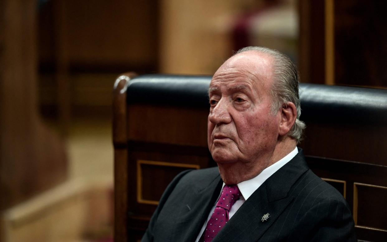 Spain's scandal-hit former king Juan Carlos I, who now lives in exile - OSCAR DEL POZO /AFP