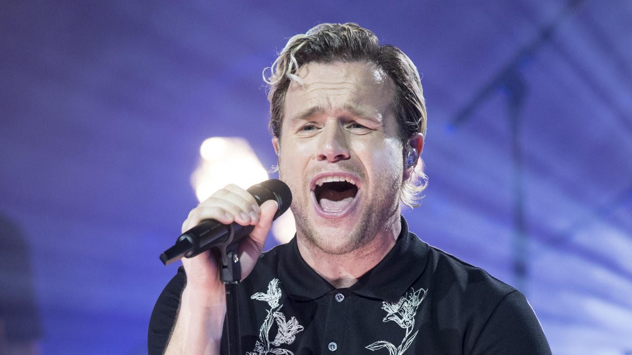 Olly Murs was hit in the face by a sun cream bottle thrown towards the stage by a fan. (Ian West/PA Images via Getty Images)