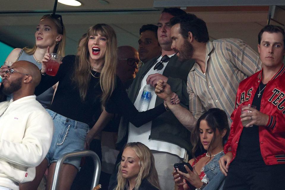 east rutherford, new jersey october 01 l r singer taylor swift and actor ryan reynolds talk prior to the game between the kansas city chiefs and the new york jets at metlife stadium on october 01, 2023 in east rutherford, new jersey photo by elsagetty images