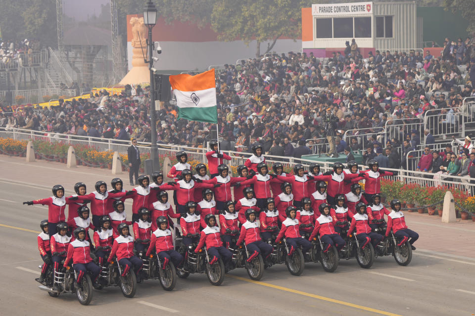 A group of female daredevils from the India armed forces performed stunts on a motorcycle on the ceremonial street Kartavyapath boulevard during India's Republic Day parade celebrations in New Delhi, India, Friday, Jan. 26, 2024. (AP Photo/Manish Swarup)