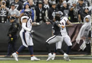 <p>Oakland Raiders wide receiver Michael Crabtree, center, fights with Denver Broncos nose tackle Domata Peko, left, and cornerback Aqib Talib during the first half of an NFL football game in Oakland, Calif., Sunday, Nov. 26, 2017. Crabtree and Talib were ejected. (AP Photo/Ben Margot) </p>