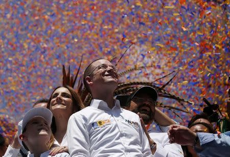 Ricardo Anaya, presidential candidate for the National Action Party (PAN), a part of the leading coalition "For Mexico in Front", reacts during his closing campaign rally at the Angel of Independence monument in Mexico City, Mexico June 24, 2018. REUTERS/Alexandre Meneghini