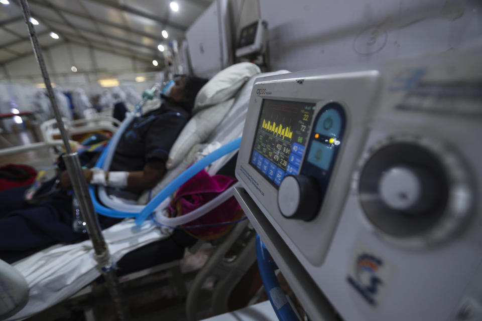 A monitor tracks a patient's parameters at the BKC jumbo field hospital, one of the largest COVID-19 facilities in Mumbai, India, Thursday, May 6, 2021. (AP Photo/Rafiq Maqbool)