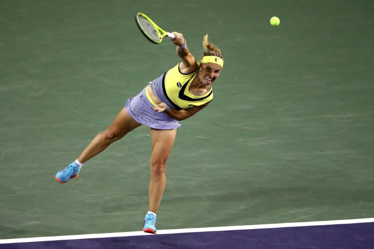 Svetlana Kuznetsova of Russia serves to Karolina Pliskova of Czech Republic during their BNP Paribas Open semi-final match, at the Indian Wells Tennis Garden in California, on March 17, 2017