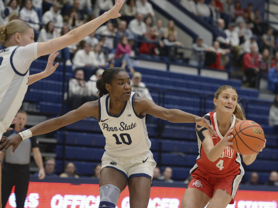 Penn State's Chanaya Pinto (10) defends against Ohio State's Jacy Sheldon (4) during the first half of an NCAA college basketball game Thursday, Feb. 22, 2024, in State College, Pa. (AP Photo/Gary M. Baranec)