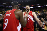 OAKLAND, CALIFORNIA - JUNE 13: Serge Ibaka #9 and Marc Gasol #33 of the Toronto Raptors celebrates their teams victory over the Golden State Warriors in Game Six to win the 2019 NBA Finals at ORACLE Arena on June 13, 2019 in Oakland, California. NOTE TO USER: User expressly acknowledges and agrees that, by downloading and or using this photograph, User is consenting to the terms and conditions of the Getty Images License Agreement. (Photo by Ezra Shaw/Getty Images)