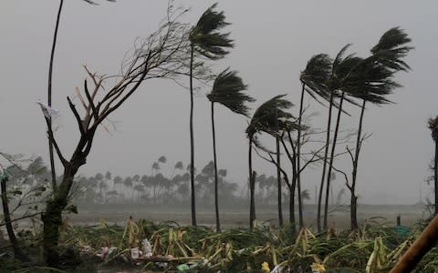 Cyclone Fani tore through India's eastern coast on Friday as a grade 5 storm - Credit: AP Photo