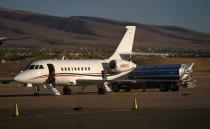 FILE PHOTO: A business jet is refuelled using Jet A fuel at the Henderson Executive Airport during the National Business Aviation Association (NBAA) exhibition in Las Vegas