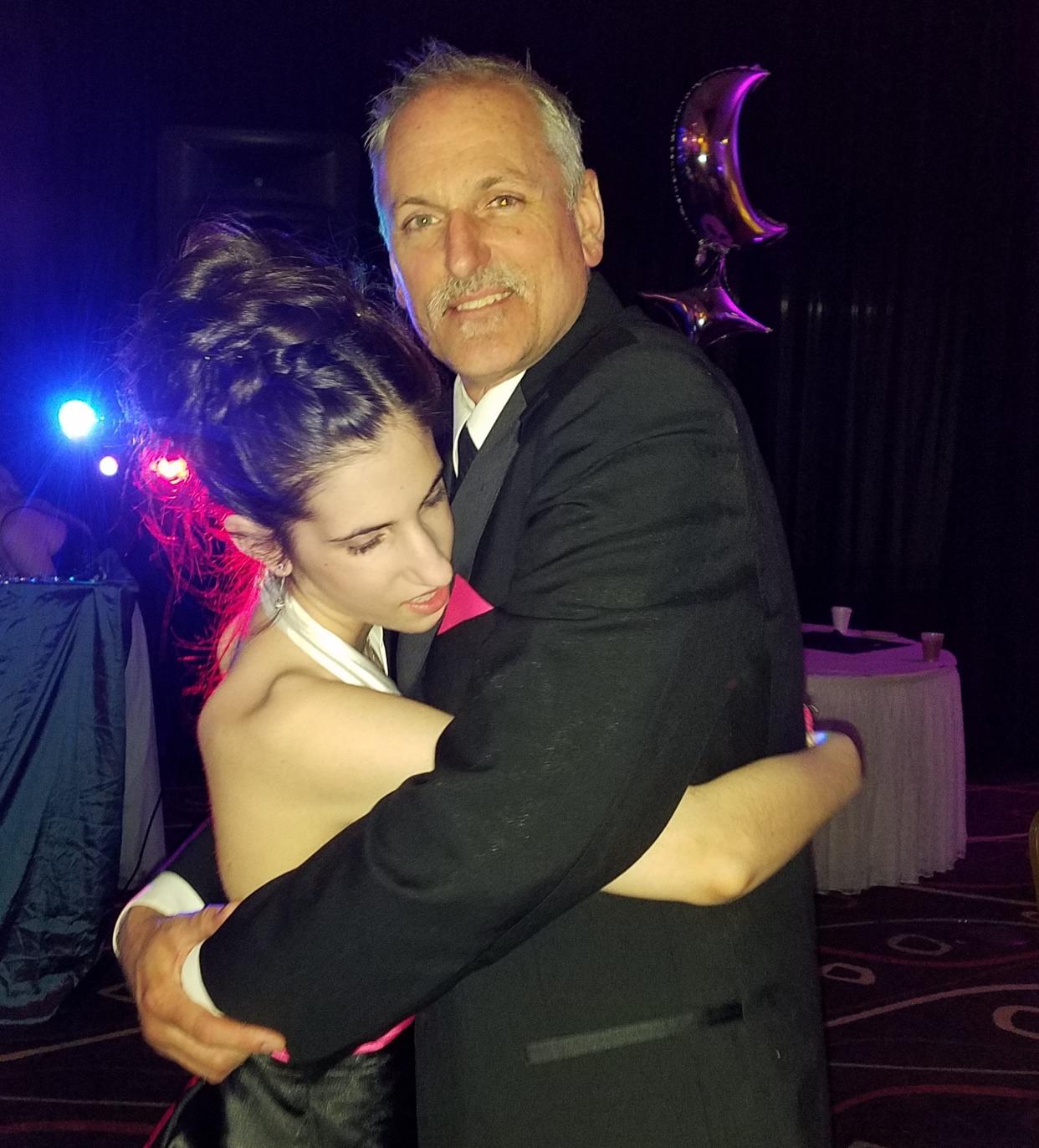 Thomas Perl poses with his daughter Tori at the Batavia High School prom. (Credit: Thomas Perl)