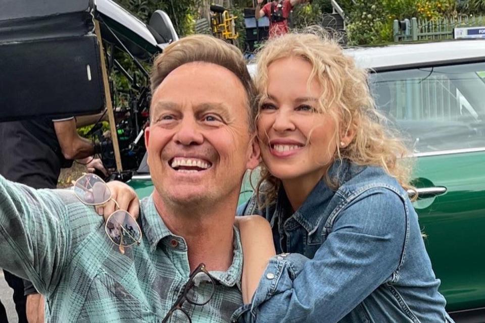 Former Neighbours stars Kylie and Jason Donovan, who play the iconic characters of Scott Robinson and Charlene Mitchell, were back on set of Ramsay Street in Melbourne in July for the soap’s finale (Jason Donovan)