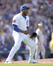 Chicago Cubs relief pitcher Héctor Neris celebrates after the last out of the team's 6-5 win over the Milwaukee Brewers in a baseball game Saturday, May 4, 2024, in Chicago. (AP Photo/Charles Rex Arbogast)
