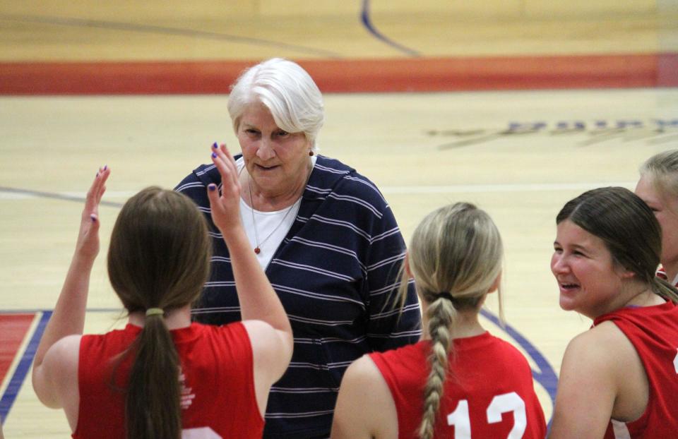 Former Martinsville head coach Jan Conner speaks to the junior varsity group during Monday's Basketball Frenzy at John R. Wooden Gymnasium.