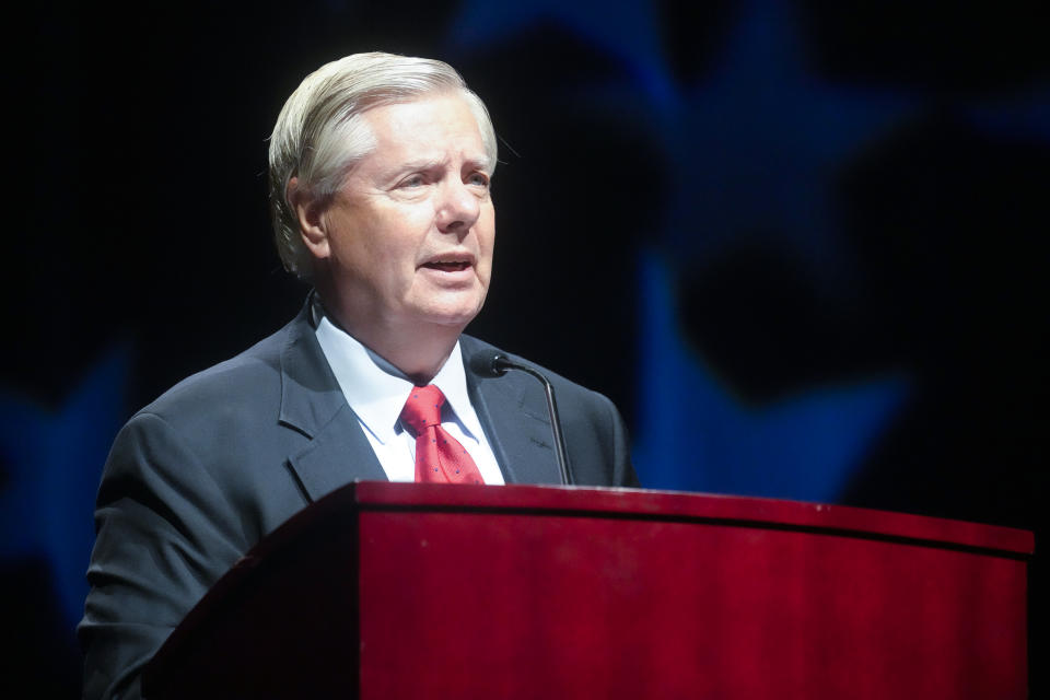 FILE - Sen. Lindsey Graham, R-S.C., addresses a South Carolina GOP dinner July 29, 2022, in Columbia, S.C. Graham has formally appealed a judge’s order requiring him to testify before a special grand jury investigating whether former President Donald Trump and others illegally sought to overturn his 2020 election defeat in Georgia. (AP Photo/Meg Kinnard, File)