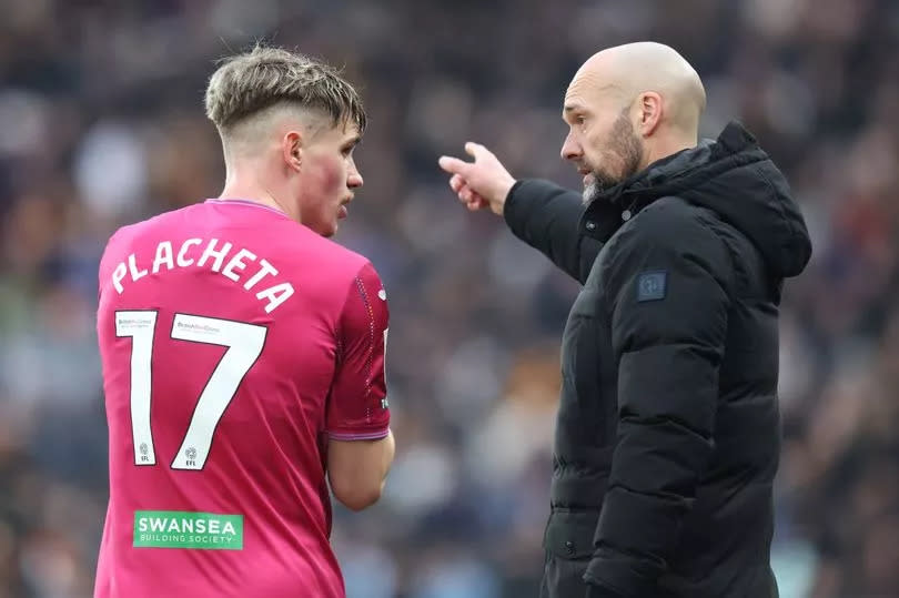 Swansea City head coach Luke Williams with Przemyslaw Placheta -Credit:Ed Sykes/REX/Shutterstock