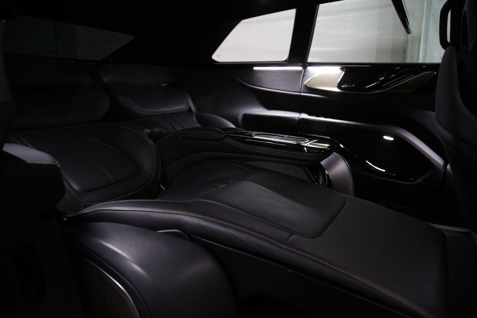 The interior of the Faraday Future FF 91, a long, low, and luxurious four-door EV is shown during the "Faraday's Future: Transforming The Road of Future Mobility," panel discussion at the AutoMobility LA auto show at the Los Angeles Convention Center in Los Angeles Tuesday, Nov. 19, 2019. (AP Photo/Damian Dovarganes)
