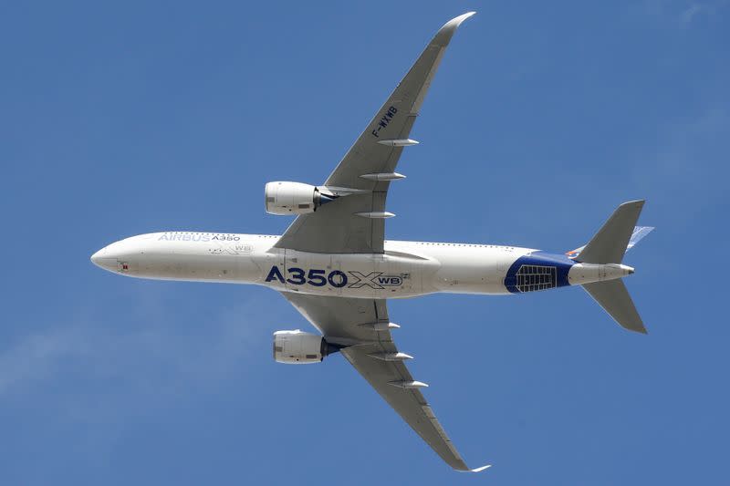 FILE PHOTO: An Airbus A350 takes off at the aircraft builder's headquarters in Colomiers near Toulouse