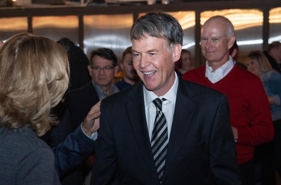 Republican mayoral candidate Jefferson Shreve laughs with supporters Tuesday, May 2, 2023, during his election night watch party at the Hotel Tango in Indianapolis.